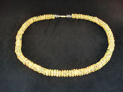 Orange & green round stone necklaces; on nylon wire; approx. 22" long; w/screw clasp.