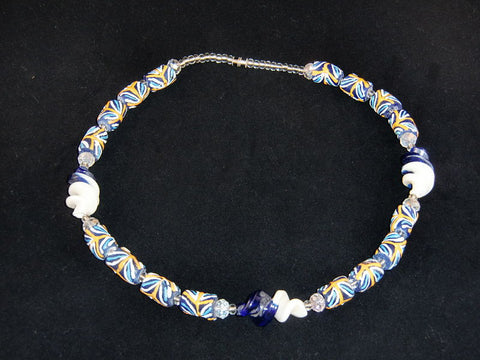 Blue beads, w/orange & white painted designs and distinctive swirled accent beads; on nylon wire; approx. 18" long; w/screw clasp.