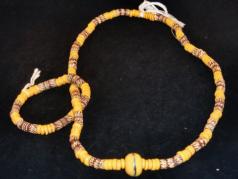 Brown w/beige spacer beads, hand-painted beige designs & accent stone; on string / tie-on; neck beads approx. 36" long; wrist beads approx. 11" long.